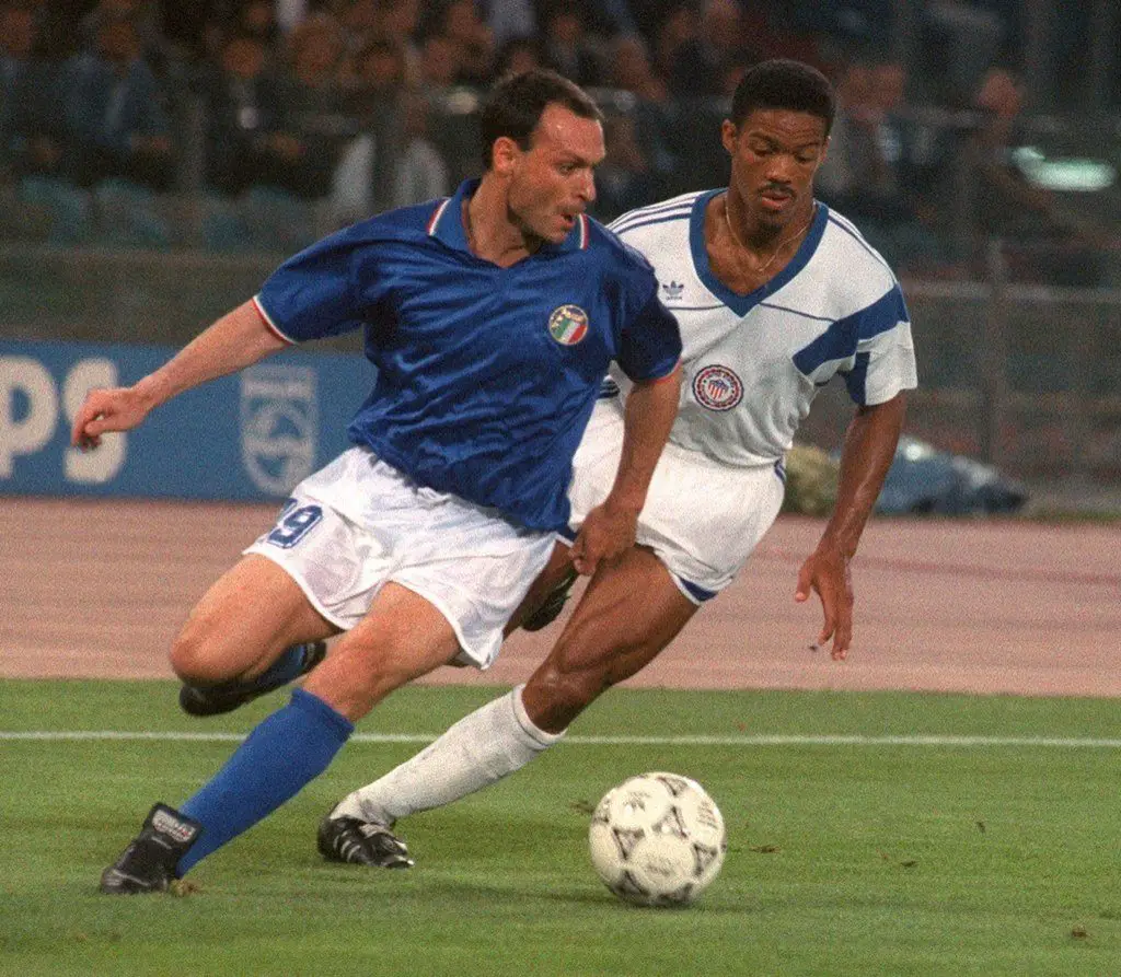 Salvatore Schillaci driving at a defender during Italia 90.